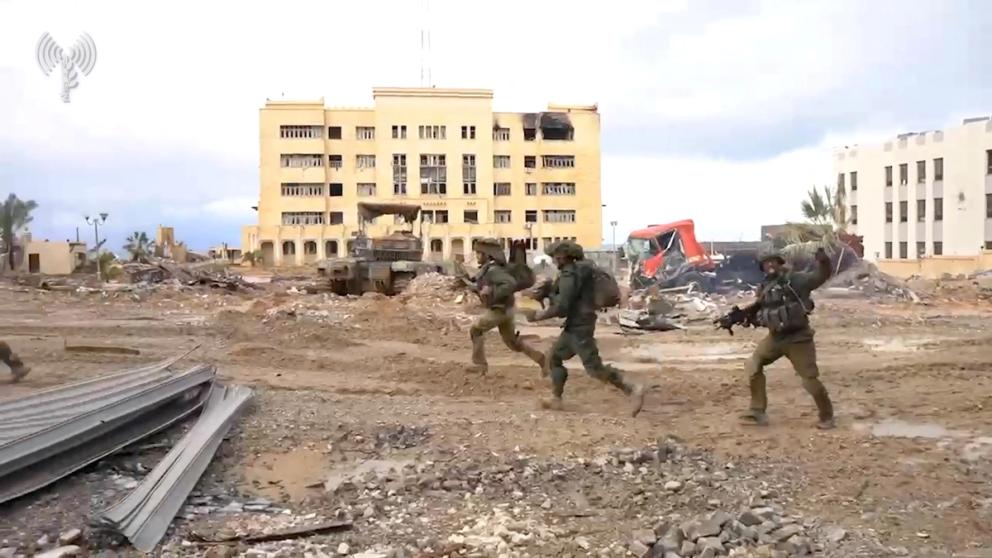 Israeli soldiers operate in the Gaza Strip amid the ongoing conflict between Israel and the Palestinian Islamist group Hamas, in this screen grab taken from a handout video released on January 31, 2024. 