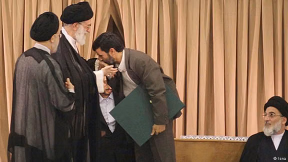 Fromer Iranian president Mahmoud Ahmadinejad kissing the hands of Supreme Leader Ali Khamenei during his inauguration ceremony in Tehran