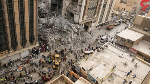 The aftermath of the collapse of a part Metropol Twin Towers in the southwestern city of Abadan