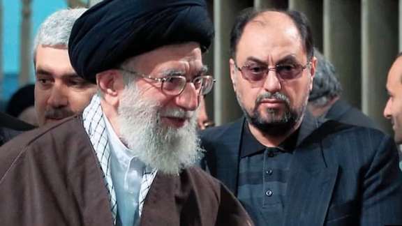 Vahid Haghanian next to Supreme Leader Ali Khamenei in an undated photo.