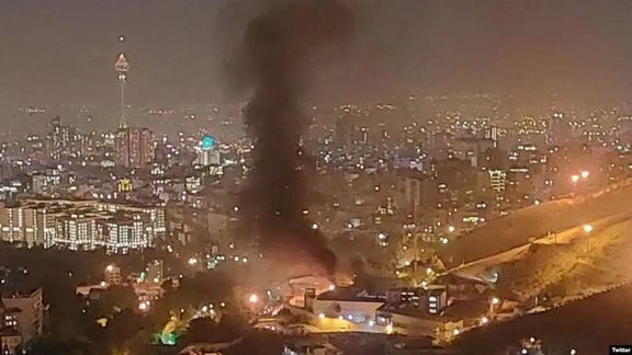 Tehran's notorious Evin Prison with fires burning inside the sprawling complex on October 15, 2022