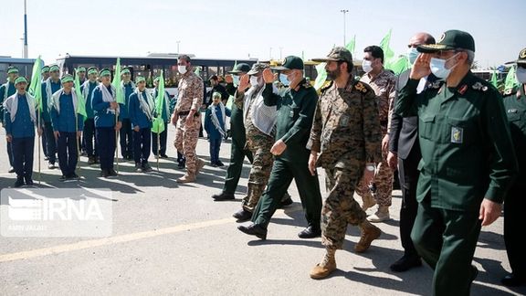 IRGC commanders reviewing a large military event in Tehran on May 20, 2022