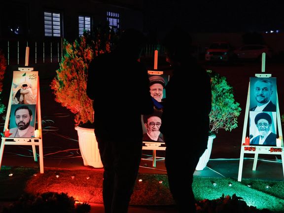 Men stand as they offer condolences over the deaths of Iran's President Ebrahim Raisi and others, at the representative office of Iran's Supreme Leader Ayatollah Ali Khamenei in Mosul, Iraq May 21, 2024.
