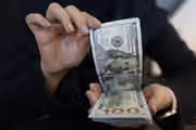 رکوردشکنی پیاپی نرخ ارز در ایران؛ دلار به ۲۱۰ هزار تومان رسید