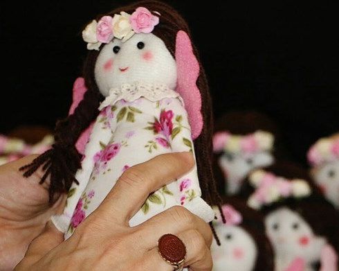 حرم خواهر امام هشتم شیعیان از کودکان خواست برای کمک به جبهه مقاومت، عروسک بسازند