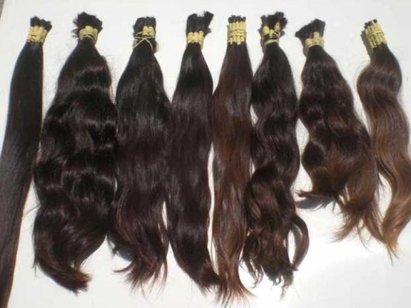 Photos published by a newspaper in Iran showing hair women sell to survive.