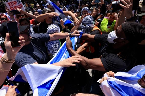 Protesters in support of Palestinians in Gaza and pro-Israel counter-protesters scuffle during demonstrations amid the ongoing conflict between Israel and the Palestinian Islamist group Hamas, at the University of California Los Angeles (UCLA) in Los Angeles, California, U.S. April 28, 2024.
