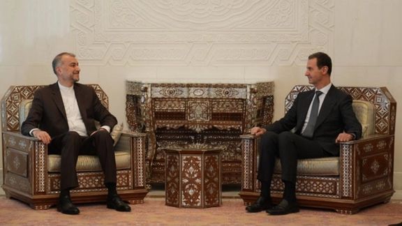 Syrian President Bashar al-Assad (right) meets with Iranian Foreign Minister Hossein Amir-Abdollahian in Damascus on August 31, 2023.
