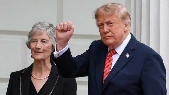 US President Donald Trump raises his fist as he meets Irish President Catherine Connolly at Aras an Uachtarain, in Dublin, Ireland, September 12, 2026.
