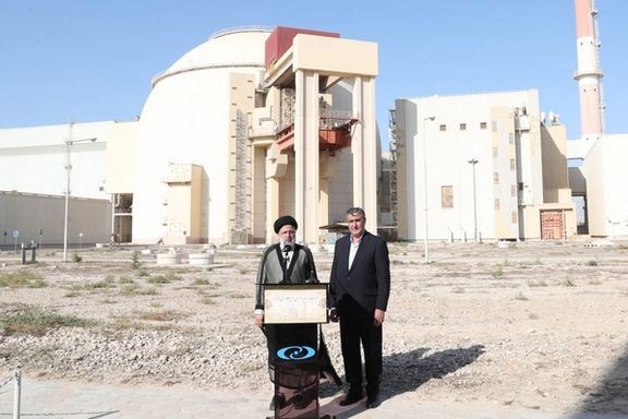 Iranian President Ebrahim Raisi (left) and head of Iran's Atomic Organization Mohammad Eslami during a visit to Bushehr nuclear power plant, in the city of Bushehr, southern Iran