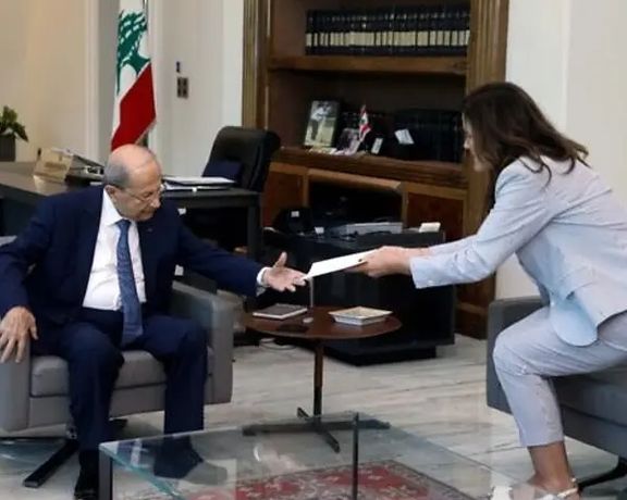 Lebanese President Michel Aoun (left) receives a proposal from US ambassador to Lebanon Dorothy Shea on October 1, 2022