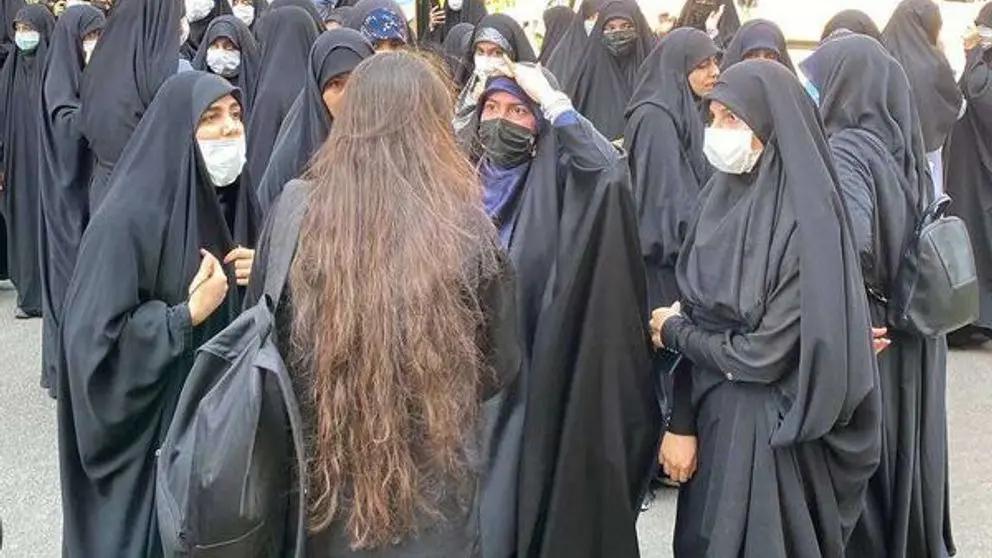 An Iranian woman without mandatory hijab in public