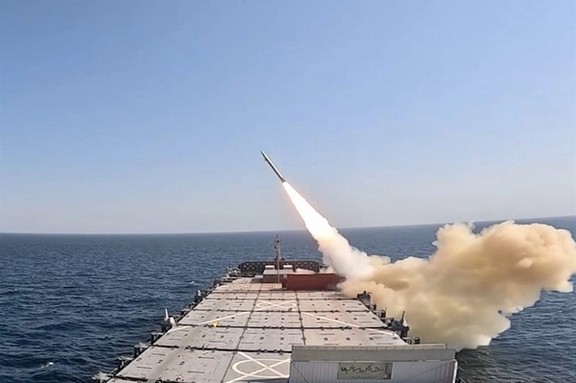 A photo of the test launch of a long-range ballistic missile fired from a warship on February 13, 2024