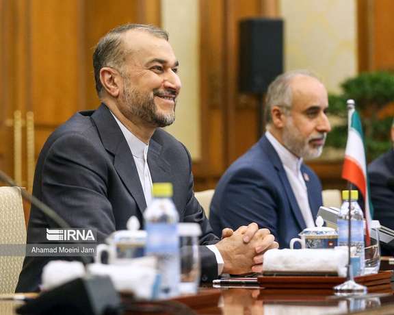 Iran’s Foreign Minister Hossein Amir-Abdollahian (left)
