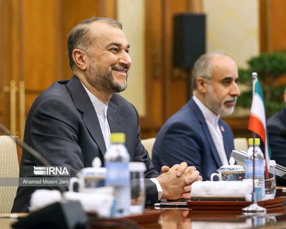 Iran’s Foreign Minister Hossein Amir-Abdollahian (left)