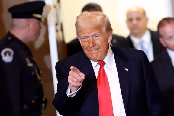 US President Donald Trump walks on the day of the annual National Prayer Breakfast at the US Capitol in Washington, February 6, 2025.