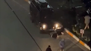 Canada condemns Iran after video shows armored car running over protesters