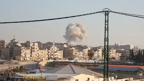 Smoke billows in the aftermath of what the White Helmets say is a strike, in Idlib, Syria, released December 1, 2024, in this still image taken from a handout video.