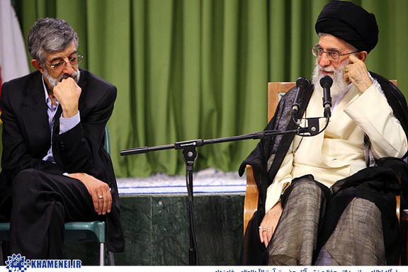 Former chairman of the Parliament Gholam-Ali Haddad-Adel (left) and Supreme Leader Ali Khamenei