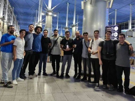 A group of students of Sharif University at the Tehran International Airport before leaving Iran