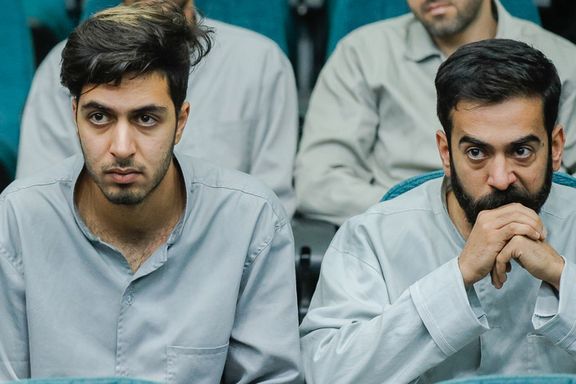 Mohammad Mehdi Karami (left), sentenced to death for the alleged murder of a pro-regime Basij member