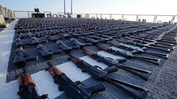 Thousands of AK-47 assault rifles sit on the flight deck of guided-missile destroyer USS The Sullivans (DDG 68) during an inventory process on January 7, 2023.