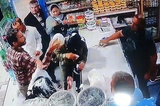 A screengrab from the CCTV camera of the shop where women were attacked in the city of Shandiz