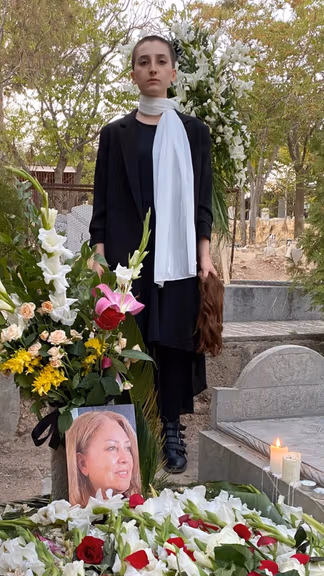 Roya Piraei at her mother's grave.