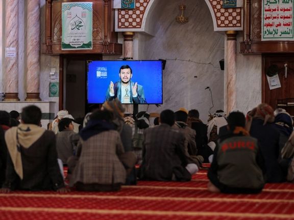 Newly recruited Houthi fighters watch a recorded lecture on Israel and the Jews by the Houthi movement's top leader, Abdul-Malik al-Houthi, during a ceremony at the end of their training in Sanaa, Yemen January 11, 2024.