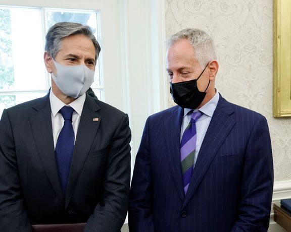 Michael Ratney (R) with Secretary of State Antony Blinken in August 2021