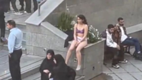 Iranian student strips in protest against assault by hijab enforcers