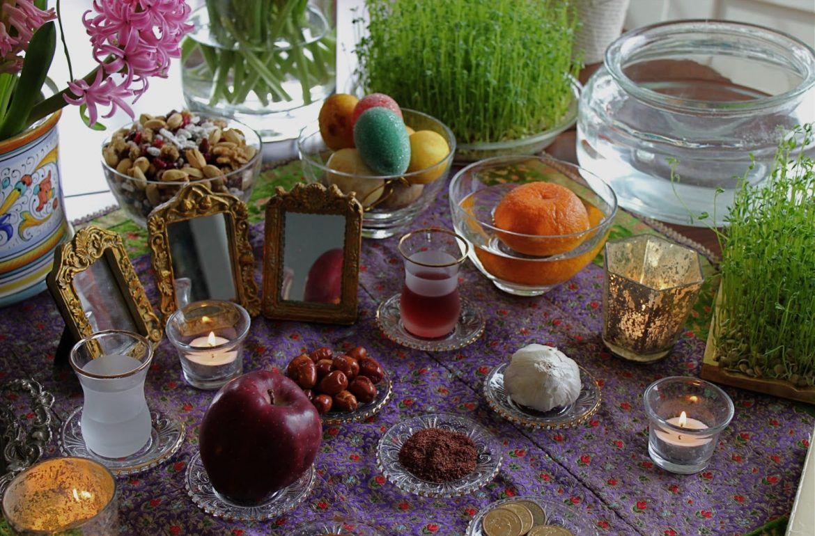 A traditional Haft-Seen table is arranged at a home ahead of Nowruz, the Persian New Year.