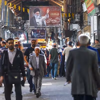 As Tehran digs in, ordinary Iranians pay the price