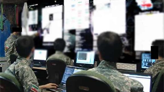 A group of IRGC forces behind computers