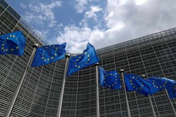 European Union flags flutter outside the EU Commission headquarters in Brussels, Belgium.