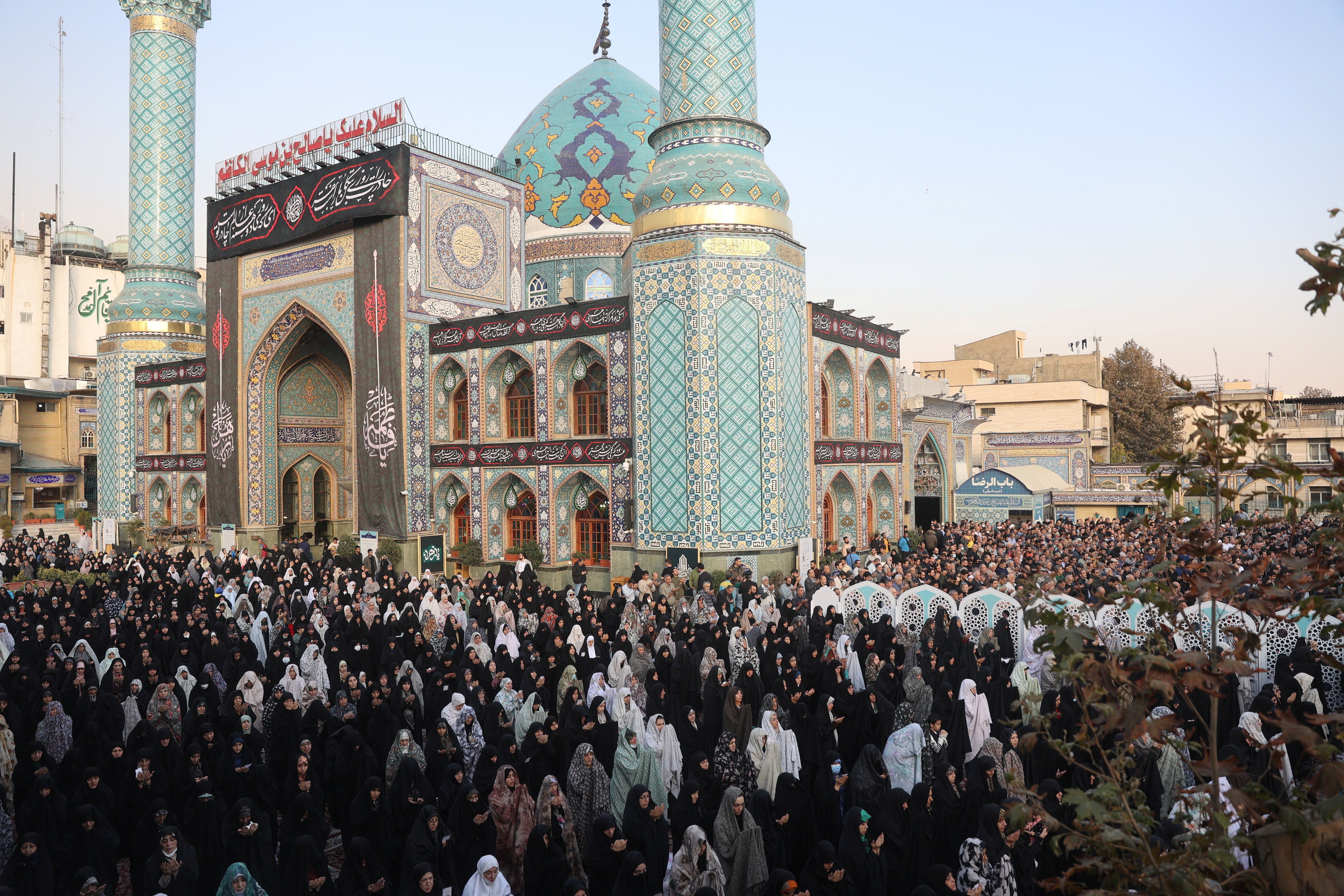 People pray for rain following a drought crisis at Imamzadeh Saleh shrine in Tehran, Iran, November 14, 2025. 