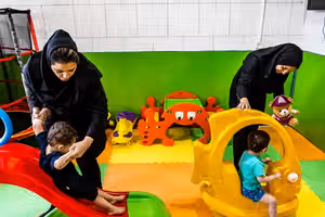 Rising daycare fees push Iranian families to rely on grandparents