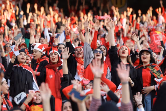 Persepolis soccer team fans gesture at a Persepolis v Sanat Naft-e Abadan match in Iran's Premier League at Azadi stadium in Tehran, Iran August 31, 2022