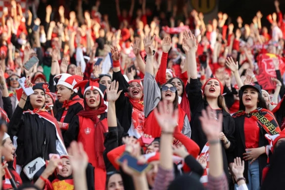 Persepolis soccer team fans gesture at a Persepolis v Sanat Naft-e Abadan match in Iran's Premier League at Azadi stadium in Tehran, Iran August 31, 2022