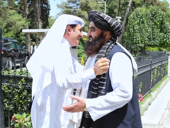 The National Security Advisor to the Emir of Qatar Mohammed bin Ahmed al-Misnad (left) and Afghanistan’s Acting Foreign Minister Amir Khan Muttaqi