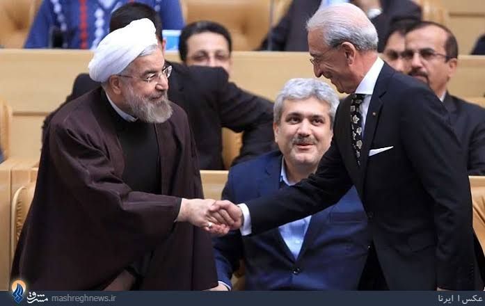 Dr.Madjid Samii (right) shaking hands with former president Hassan Rouhani in Tehran in 2014
