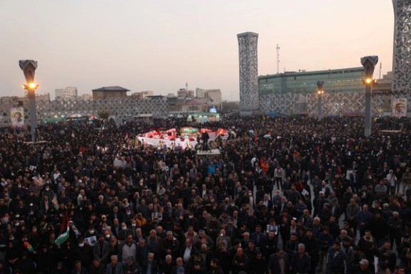 People gather for the funeral ceremony of Panah Taghizadeh and Mohammad-Ali Ataie, members of Iran's Islamic Revolution Guards Corps (IRGC) who were killed in an Israeli airstrike on Syria, held in Tehran, Iran, December 4, 2023.