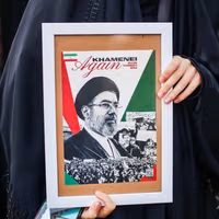 Talks or resistance? Iran's factions differ over path out of crisis