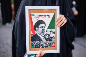 Talks or resistance? Iran's factions differ over path out of crisis