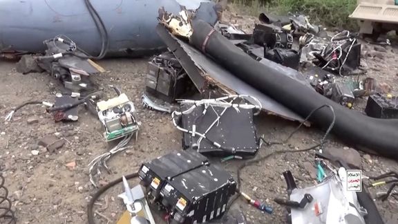 Wreckage of a U.S. MQ-9 drone that Houthis claim they shot out of the sky, in a location given as Saada Governorate, Yemen, in this undated screengrab taken from a video obtained by Reuters August 4, 2024.