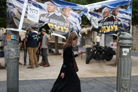 Netanyahu holds on, raises prospect of new Iran strikes