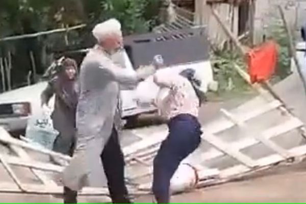 Video Showing Cleric Beating Elderly Woman Goes Viral In Iran