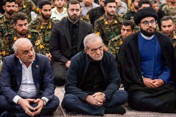 Iran's president Masoud Pezeshkian attending a ceremony commemorating security forces killed in Israeli strikes, Tehran, Iran, July 14, 2025