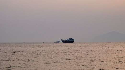 Vessels at the Strait of Hormuz, as seen from Musandam, Oman, July 21, 2026.