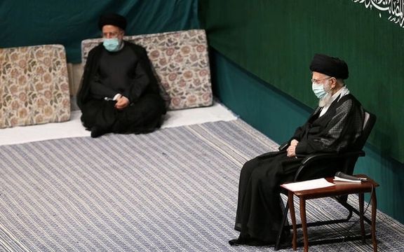 Supreme Leader Ali Khamenei (right) and President Ebrahim Raisi